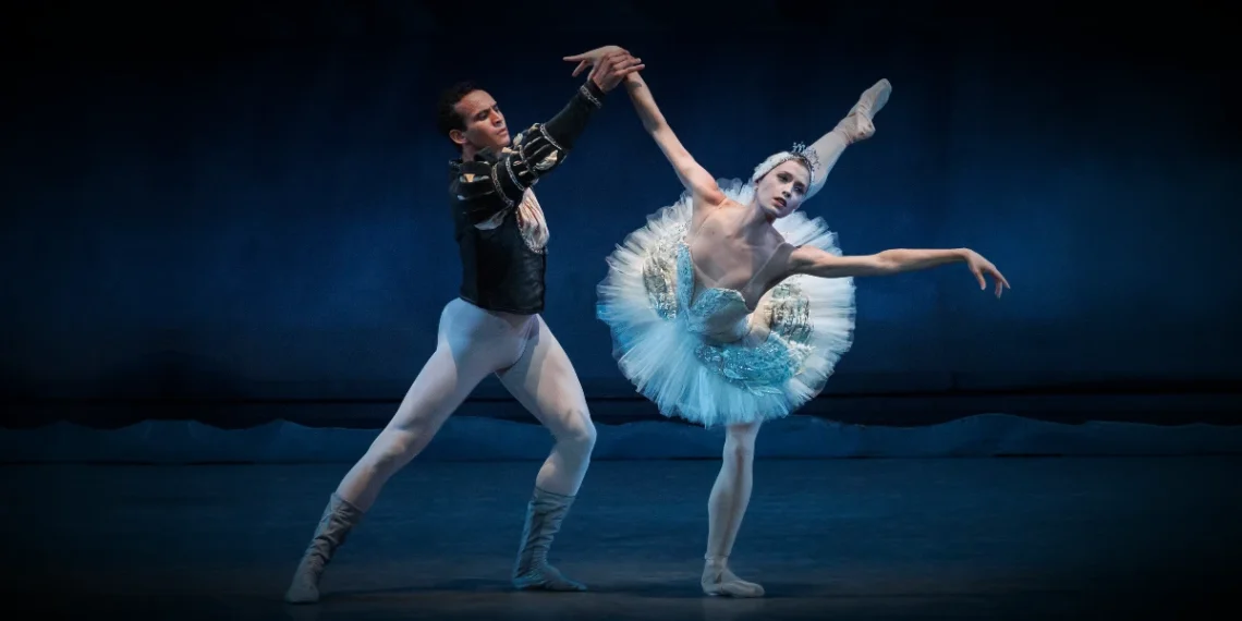 NYCB All Balanchine I Review featuring Miriam Miller in a white tutu as Odette and Ryan Tomash in a black tunic and white tights as Prince Siegfried in George Balanchine’s Swan Lake.