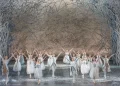 Birmingham Royal Ballet The Nutcracker Review 2025 featuring dancers in white romantic tutus and tunics in the snow scene.