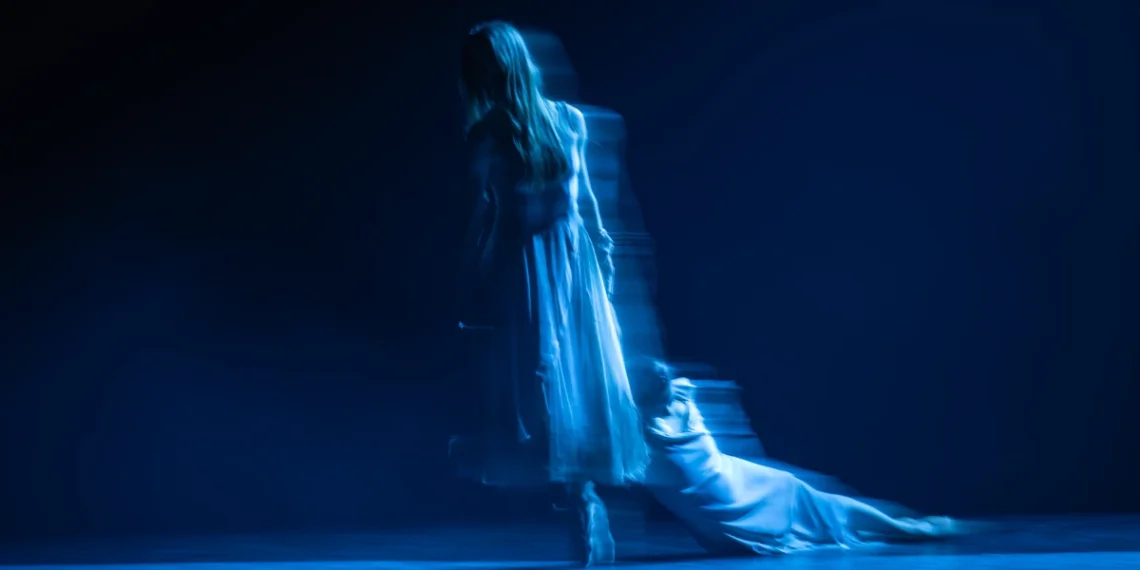 English National Ballet Giselle Review 2026 featuring Emily Suzuki as Giselle and Emma Hawes as Myrtha blurred in gray dresses.