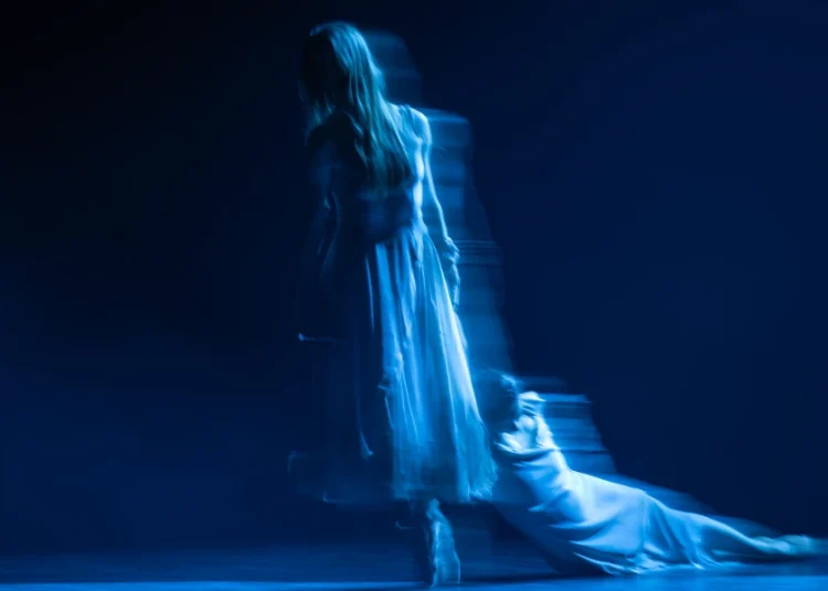 English National Ballet Giselle Review 2026 featuring Emily Suzuki as Giselle and Emma Hawes as Myrtha blurred in gray dresses.